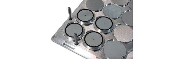 Pad grid plate